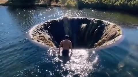 Portal To Another Dimension?It’s Actually Covão Dos Conchos Portugal That Is Famous For Its Bell-Mouth Sci-Fi Looking Spillway Covered With 60 Yr Old Moss & Foliage