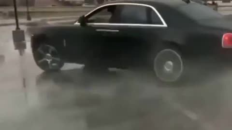 Crazy $500k Rolls Royce Phantom Burnout and Donuts on wet parking lot!!