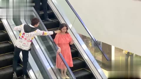 Pulling strangers cheeks on escalator