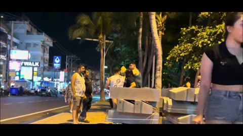 Thailand, Pattaya. Beach road with freelancers.