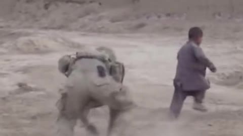 US soldier scares Afghanistan kids.