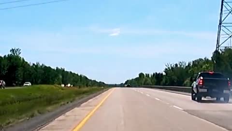 Skillful truck driver maintains control during high speed tire blowout