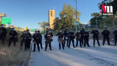 LAPD Confronts Protestors Blocking the Freeway and Threatens Immediate Arrest for Failing to Get Off