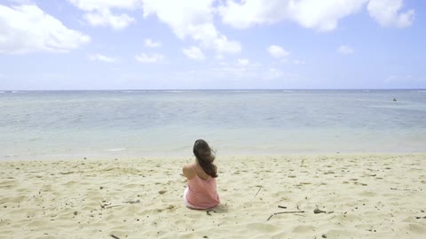 Blowing by the sea