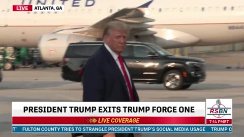 President Donald J Trump steps down from the Trump Force One in Atlanta, GA for his 4th arrest