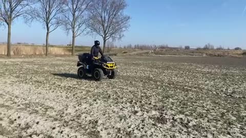 Trying to wheelie on a can am outlander 1000cc quad