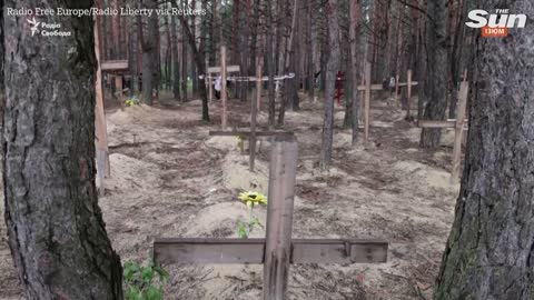 ‘Mass grave with 440 bodies’ discovered in city liberated from Russian control says Zelenskyy