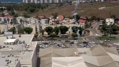 Footage shows the Iron Dome shrapnel hitting the roof of a mall in Acre earlier