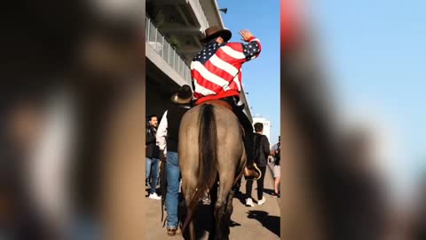 Daniel Ricciardo arrives on horseback at Circuit of the Americas