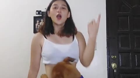 Dog disturb the girl while dancing. (Follow me)