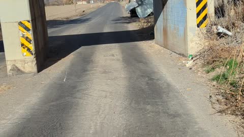 Truck Demolished After Passing Under Train Bridge