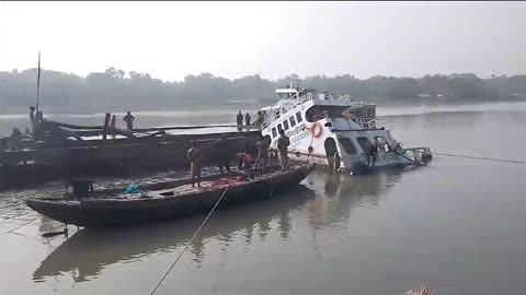 Rescuing sunken lighter vessel. Place Jessore Bangladesh