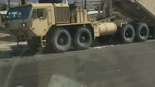 Loading The Heavy Containers on The Truck