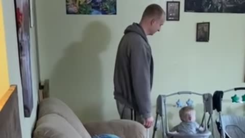 Wild 1 year old rocking himself in the swing that he climbed in by himself