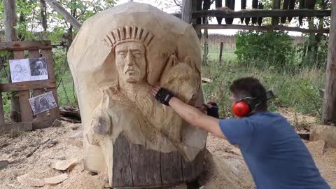 AMAZING CHAINSAW wood carving, Native American with wolves