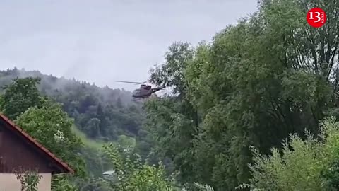 People evacuated by helicopters as floods hit Slovenia