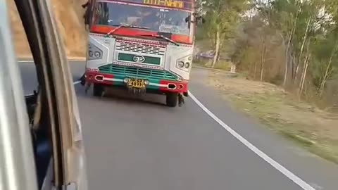 India (himachal pradesh) transport bus driving on hills