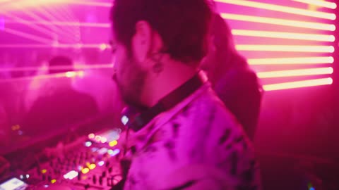 DJ playing music at a nightclub