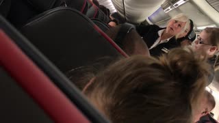 Laptop Sent Flying in Airplane Altercation