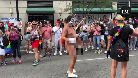 parading down the street in front of kids bare ass naked.