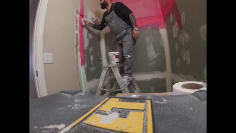 Applying Red Guard to Shower Walls