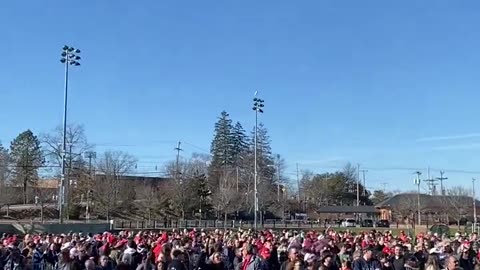 An enthusiastic crowd chants ahead of President Donald Trump’s rally