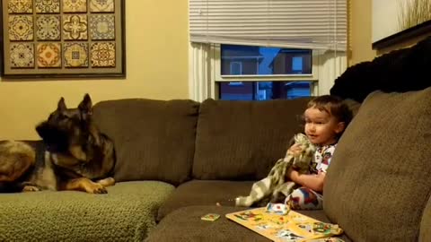 Cute Toddler Teaches German Shepherd Dog How to Howl