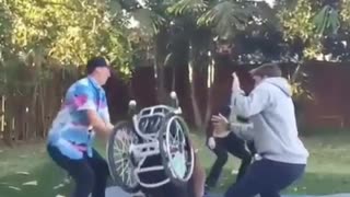 with wheelchair on trampoline