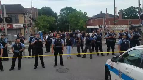 Protesters confront Chicago police after fatal shooting of armed man