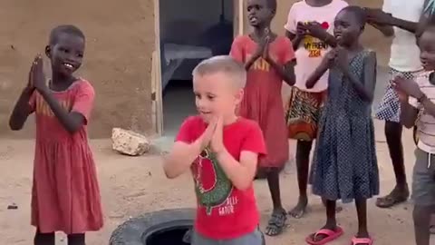 African Kids Meet First White Boy