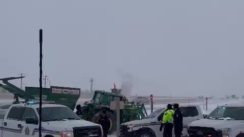 Truckers Break Through Police Barricade