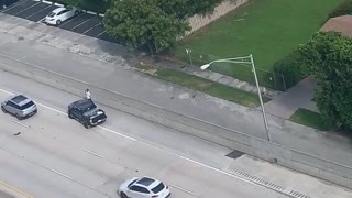 Car Slides on Slippery Interstate Surface