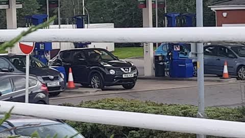 Pranksters Play Practical Jokes On Customers At A Gas Station