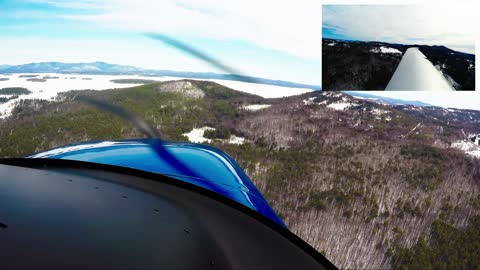 Flight over Lake Winnipesaukee, iced in.