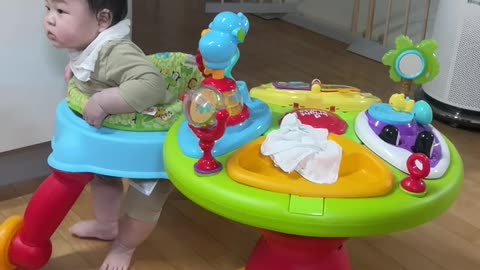 Cute baby learning to walk