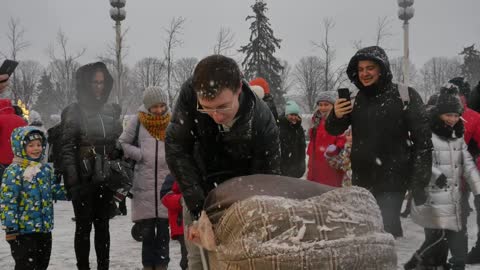 Moscow Man Dances With Pig And Pushes It Around In Pram