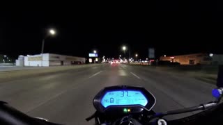 Swerving Car Zooms Past Motorcyclist