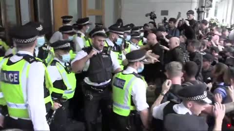 Anti-vaxxers attempt to storm MHRA HQ in Canary Wharf London, in protest of jabs for kids.