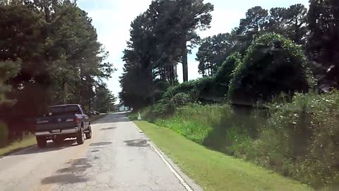 Dumbass in a hurry passing in a no passing zone on these winding Country Roads