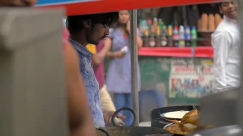 Man Preparing Traditional Indian Street Food