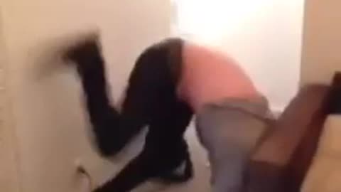 White guy twerks on wall