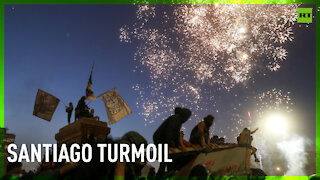 Turmoil during protest on social outbreak anniversary in Santiago