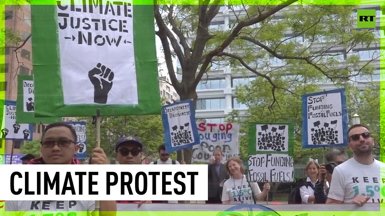 Climate activists rally outside IMF and World Bank annual meetings