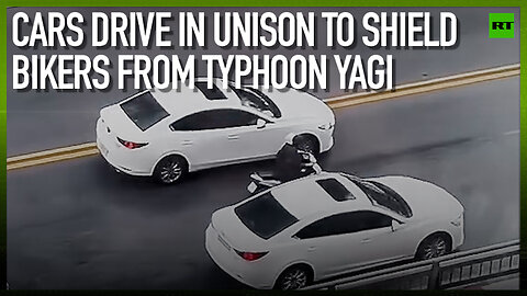 Cars drive in unison to shield bikers from Typhoon Yagi