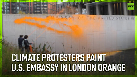 Climate protesters paint U.S. Embassy in London orange