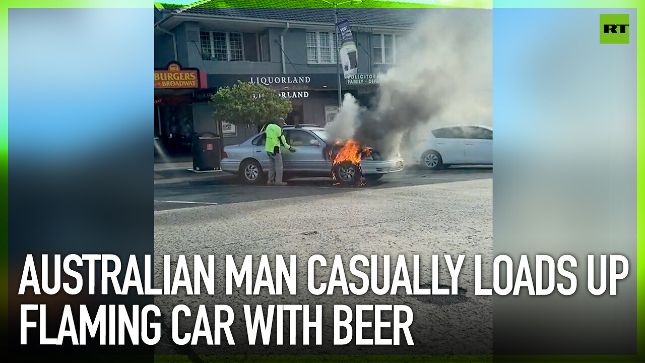 Australian man casually loads up flaming car with beer