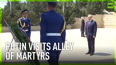 Putin lays flowers at Eternal Flame near the Alley of Martyrs in Baku