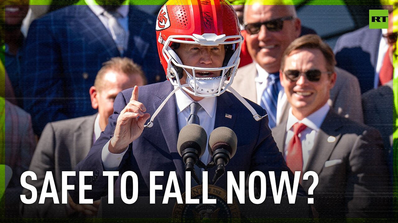 Biden puts on Chiefs helmet during team's White House visit