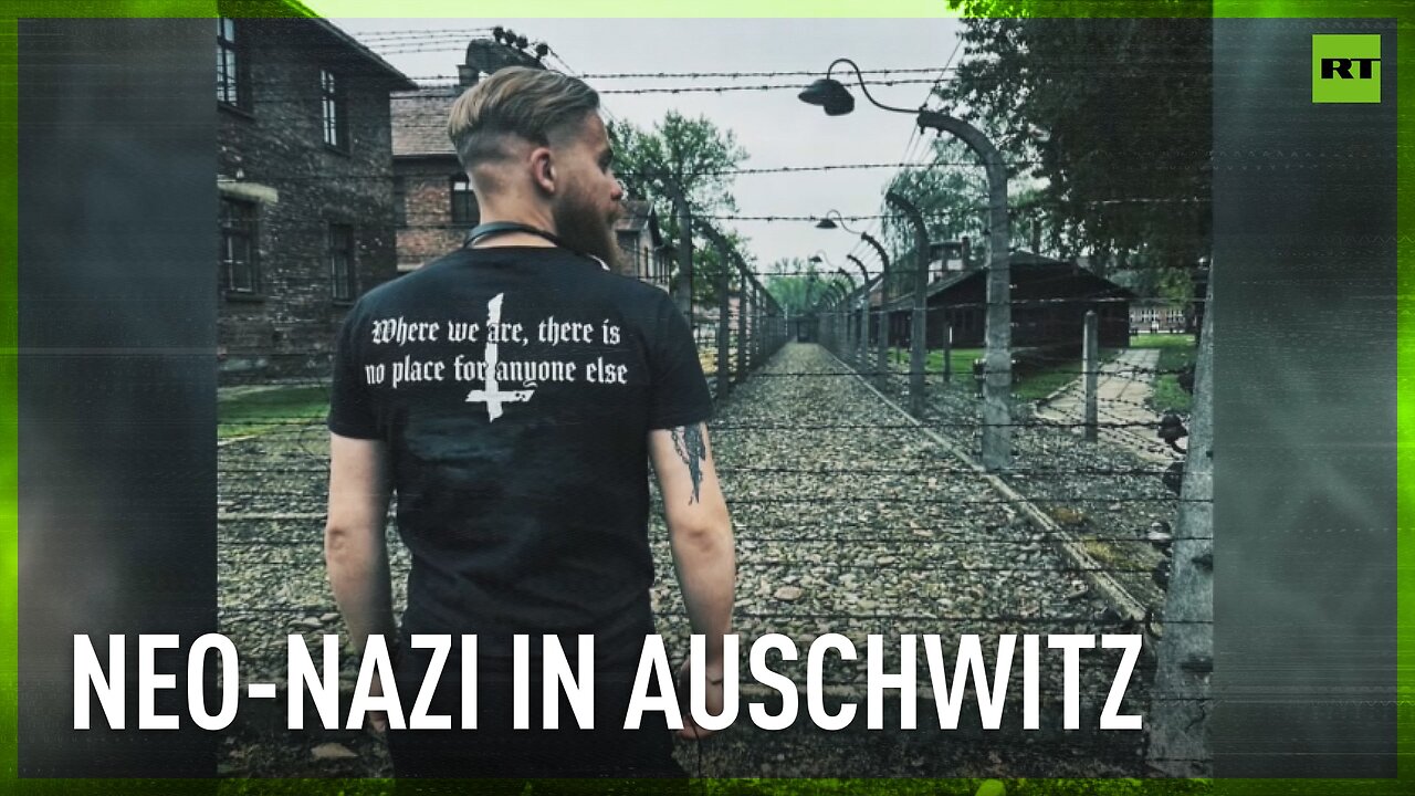 Azov veteran poses with Hitler quote at Auschwitz memorial