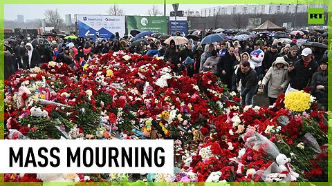 Huge queue lines up outside Crocus Hall to honor victims of terror attack